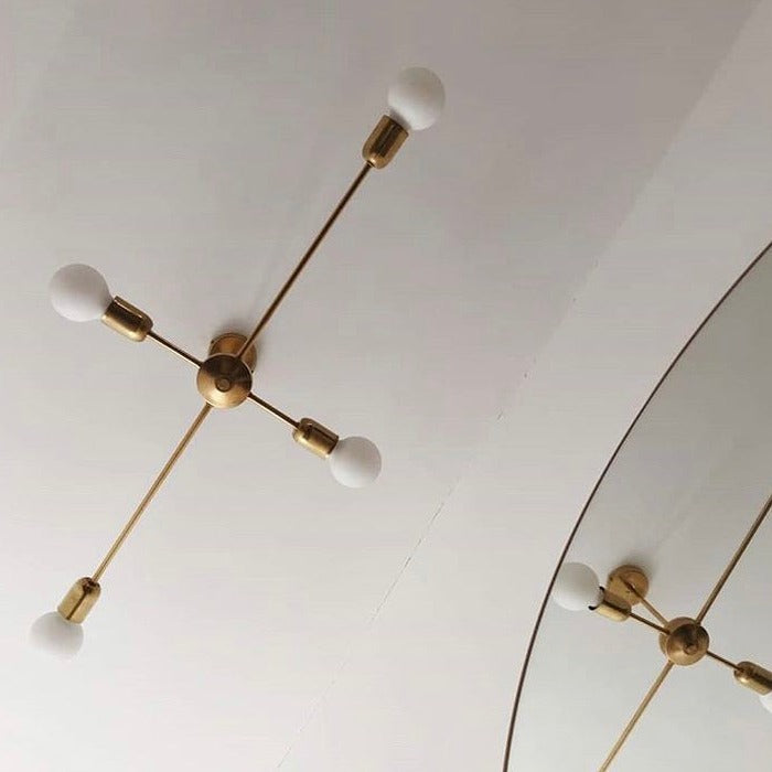 Modern brass four arm chandelier 